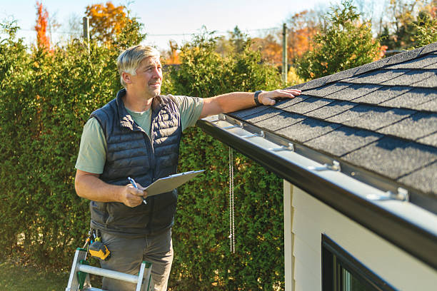 Professional Roofing technician working in White Cloud, MI